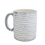 Керамична чаша със сребриста дръжка